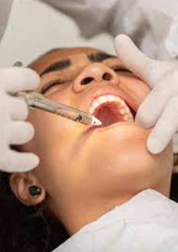Dentist explaining dental treatment to patient at Adelaide Dental Spa